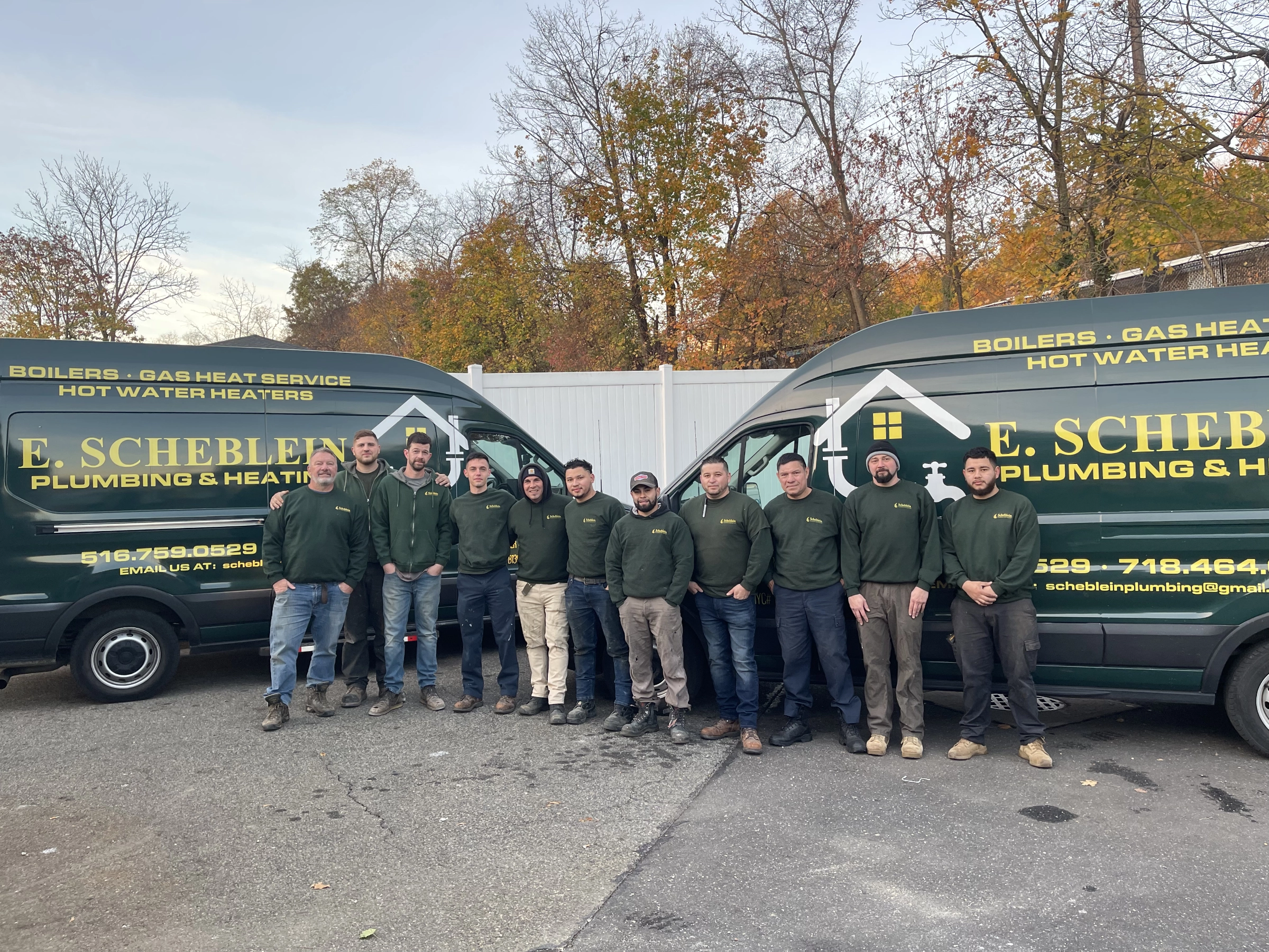 Our Scheblein team in front of their service vans.