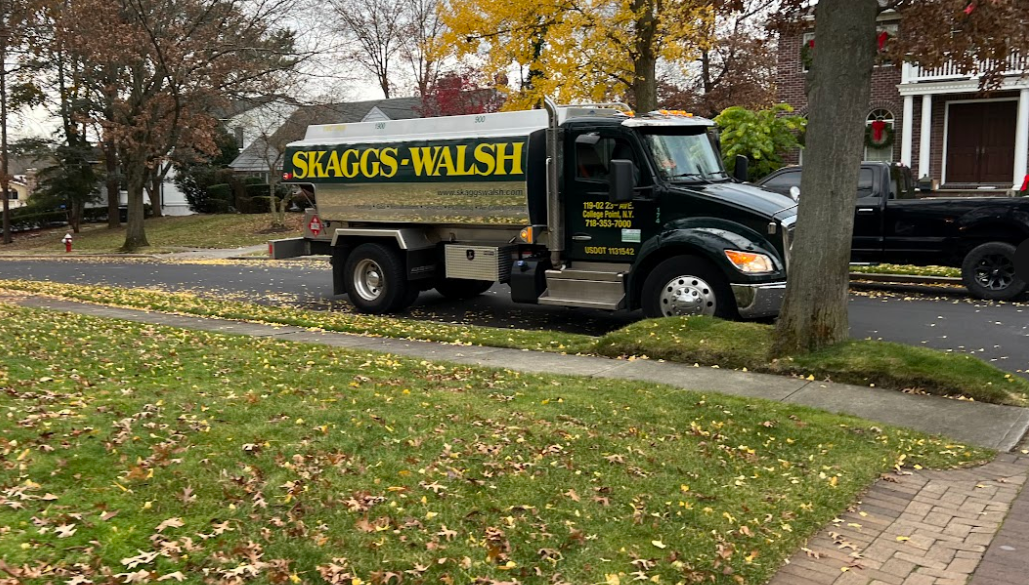 Skaggs-Walsh delivery truck performing a heating oil delivery.