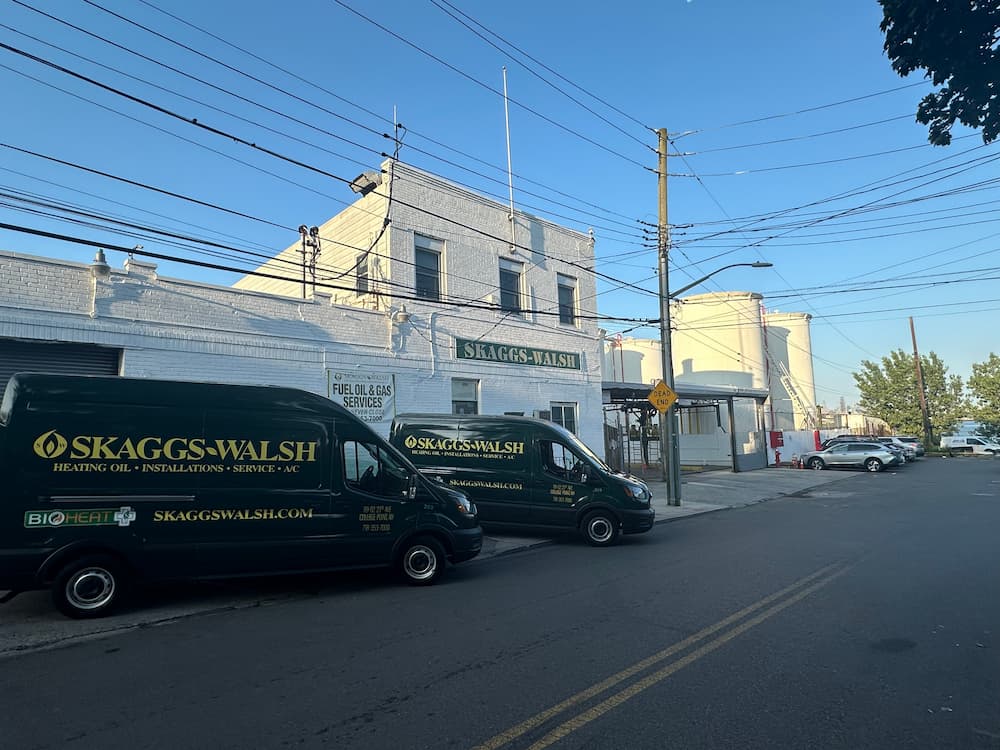 Skaggs Walsh Vans Lined Up On Street
