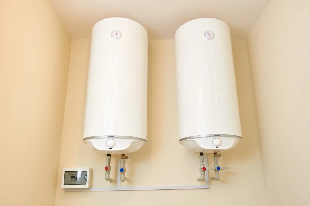 Two electric water heaters on the wall home wall 2025 04 01 05 49 39 utc